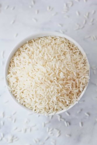 an image of dry  jasmine rice, so soft when cooked bigas online. 